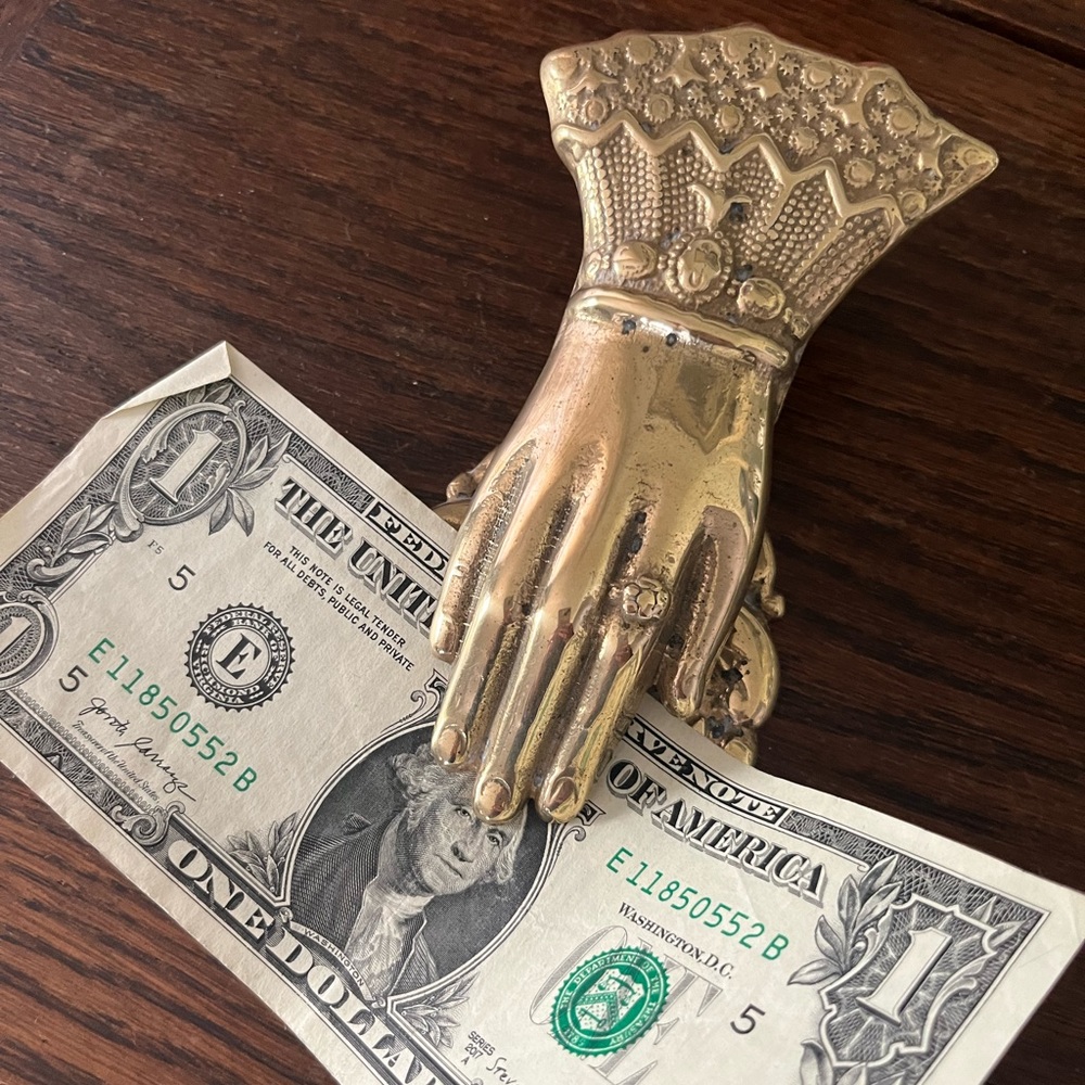 Brass hand clip for desk or wall